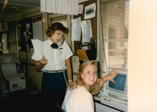 women in office performing operational duties